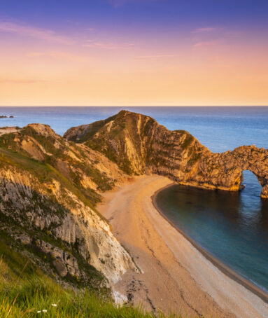 Sunset over Durdle Door and the Jurassic Coast, Dorset