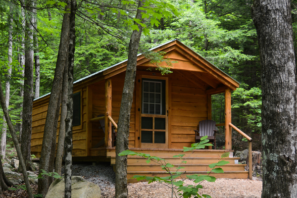 Adirondack Camping Village, rustic log cabin
