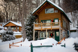 Trout House Resort log cabin in winter