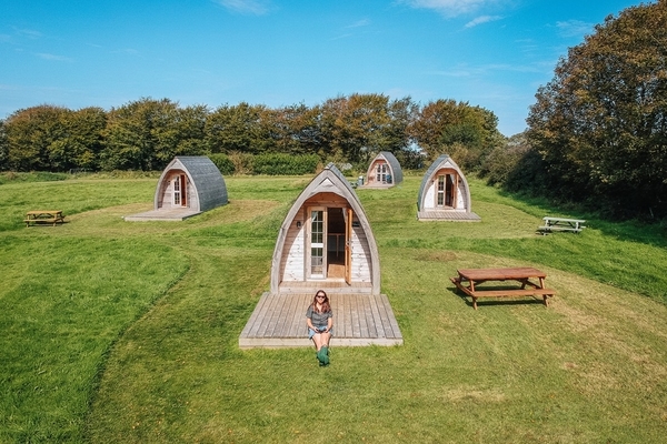 Luxury glamping pods in a paddock at Higher Culloden Farm